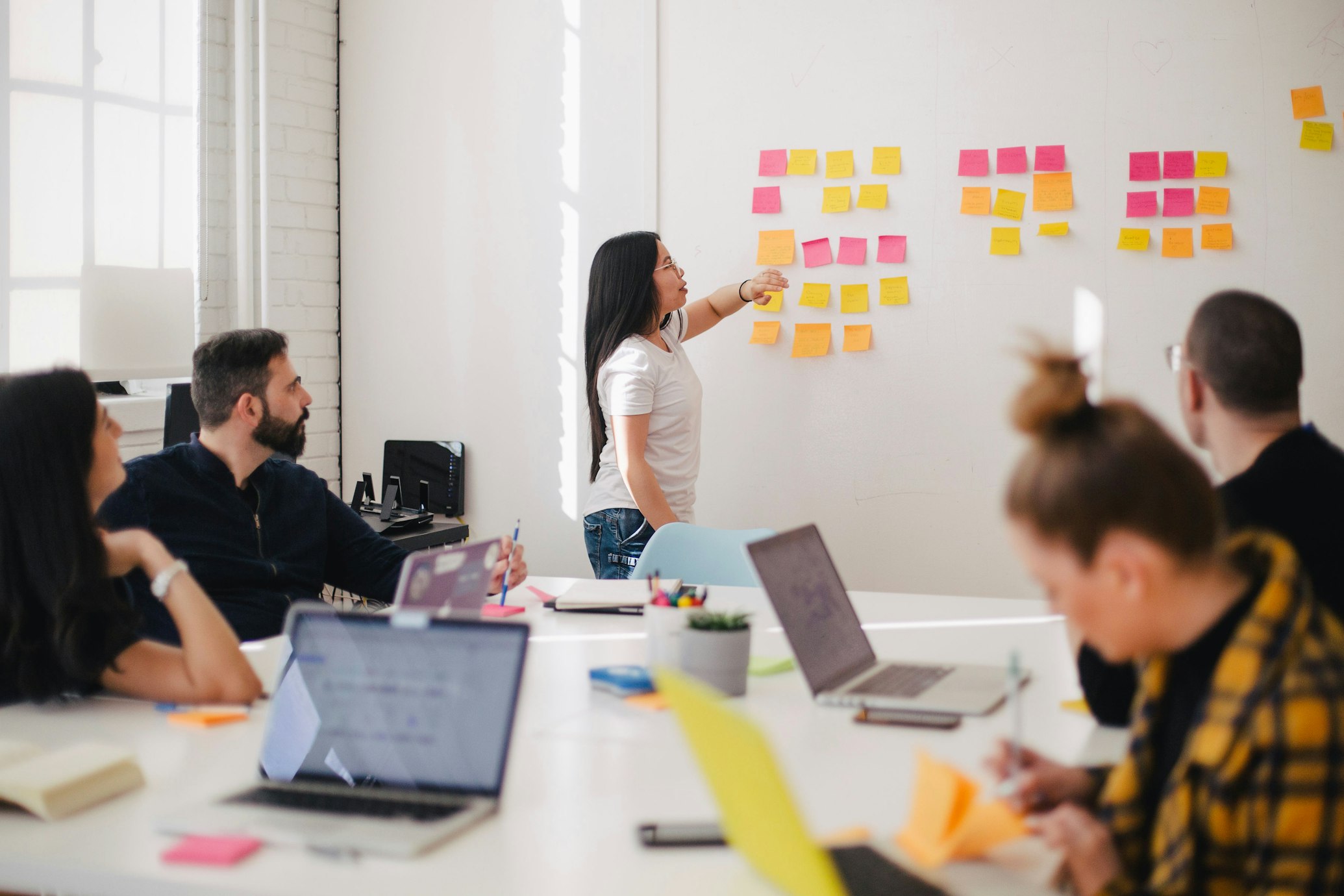 Business professionals using advanced technology